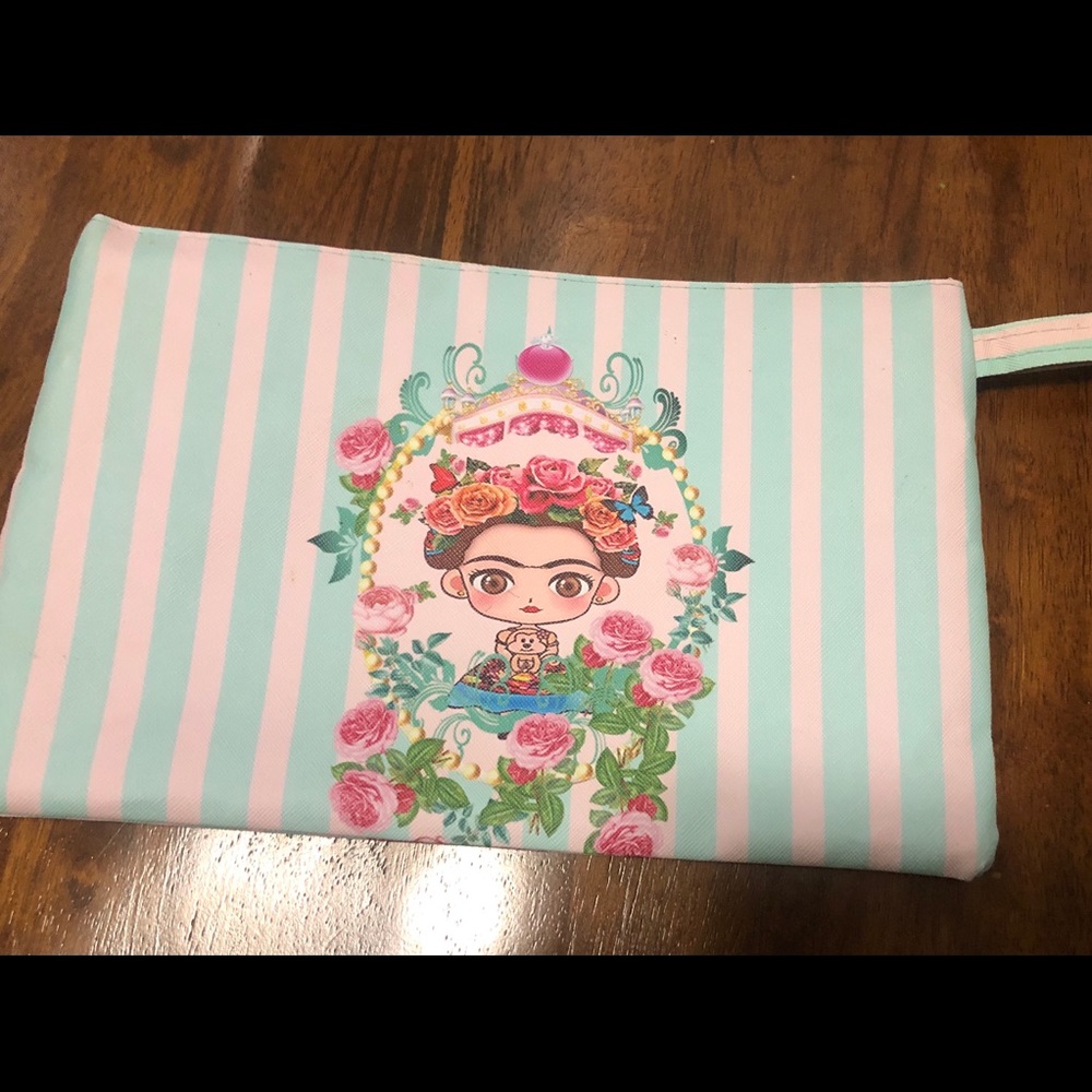 Cute small Frida Kahlo wristlet.